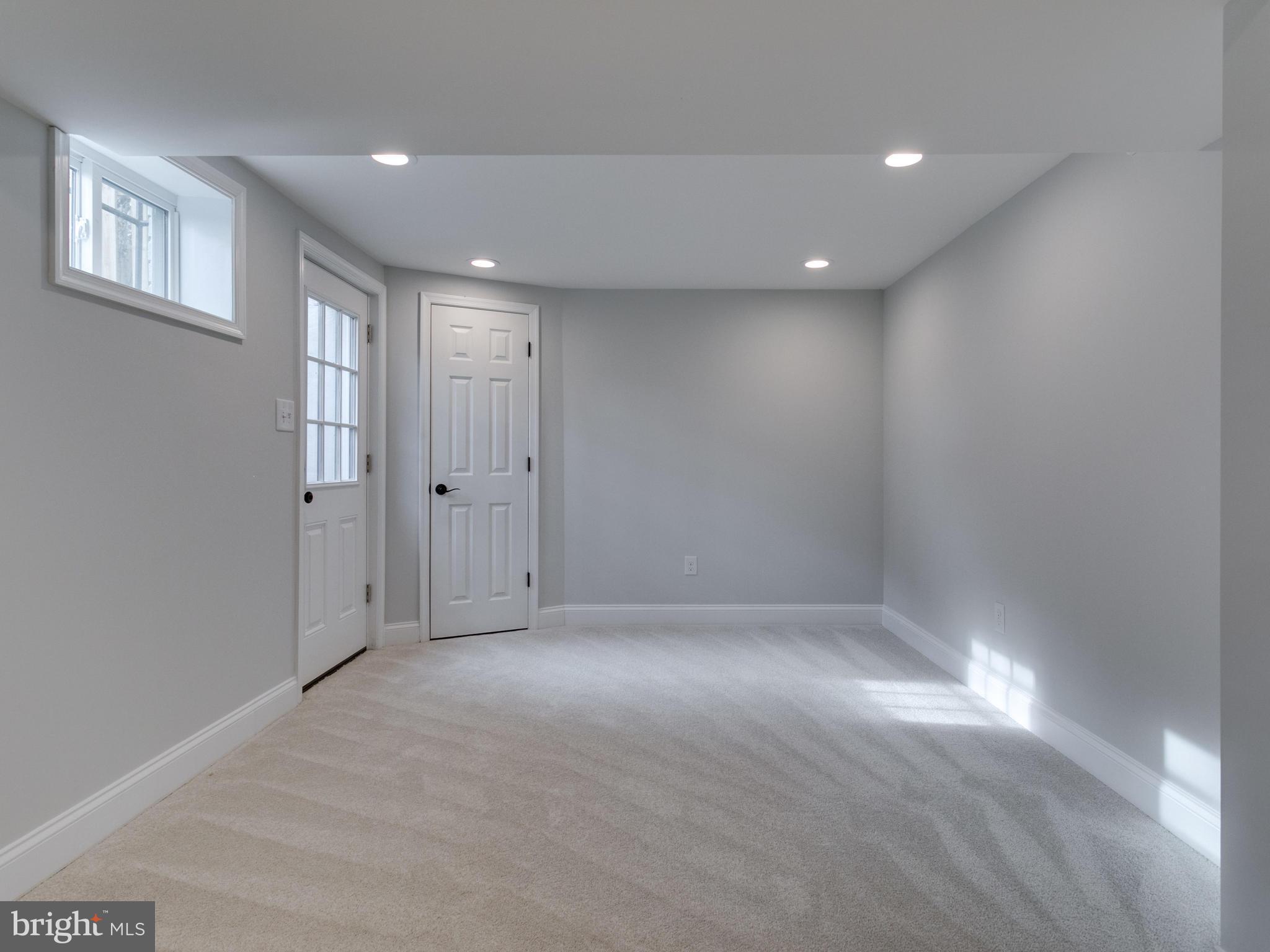8918 Victoria Road Springfield, VA 22151 - Photo 23 of 30 a view of an empty room