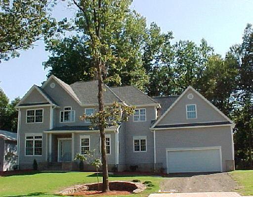 3 Ansantawae Road Milford, CT 06460 - Photo 1 of 1 a front view of a house with garden