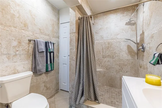 a bathroom with a sink and a shower