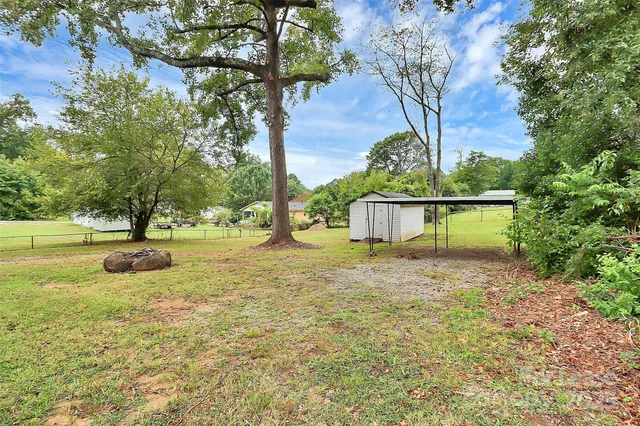 a view of a garden with a bench