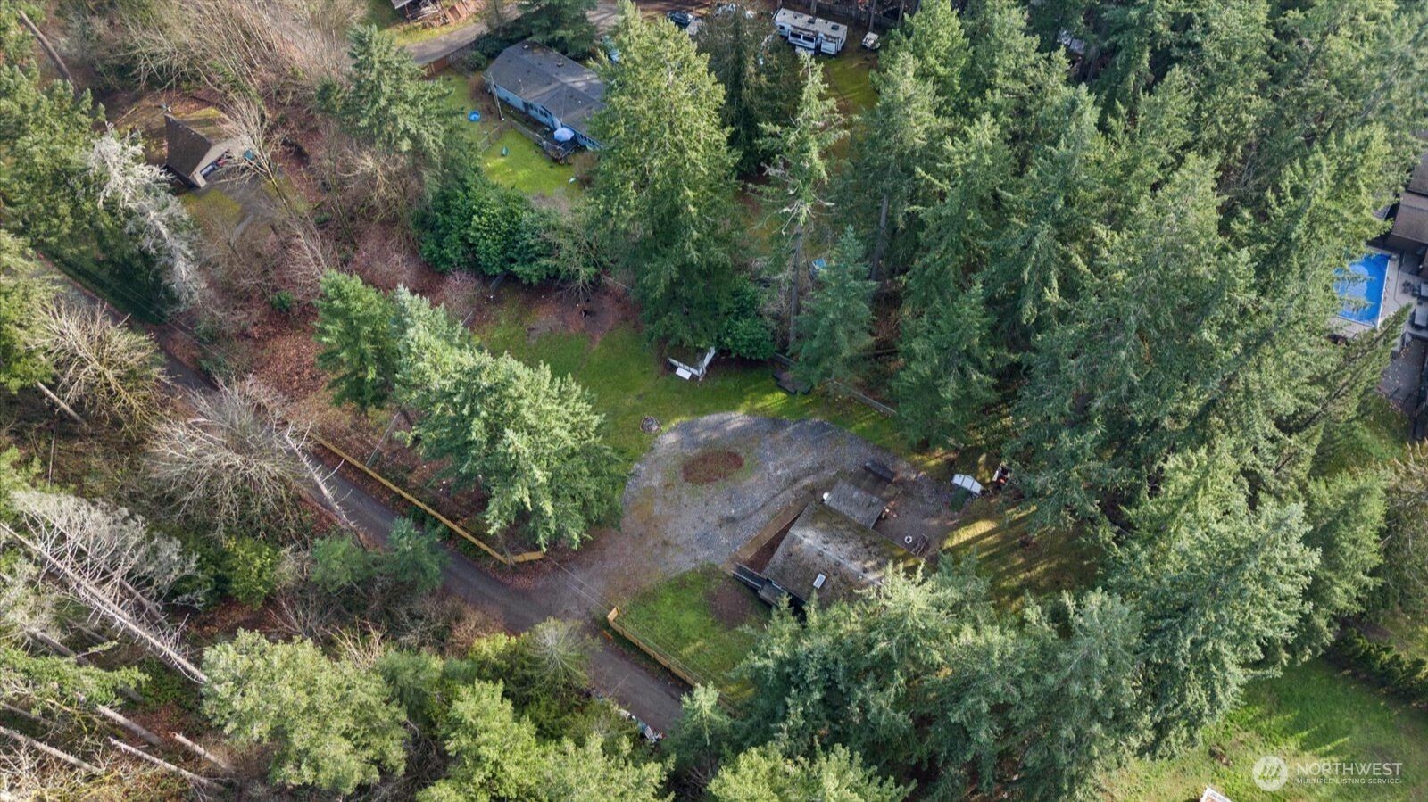 20609 Southeast 245th Place Maple Valley, WA 98038 - Photo 30 of 34 an aerial view of a house with a yard