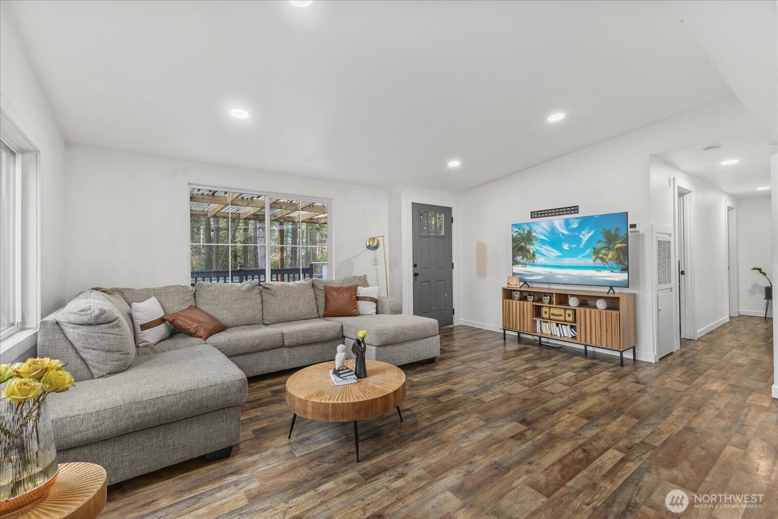 20609 Southeast 245th Place Maple Valley, WA 98038 - Photo 7 of 34 a living room with furniture and a large window