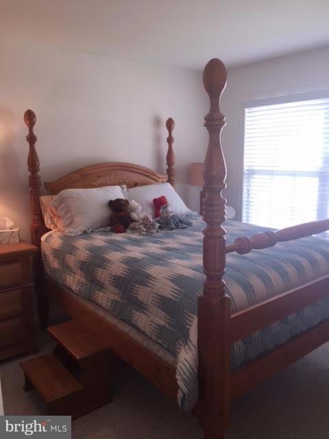 4019 Paige View Road Randallstown, MD 21133 - Photo 14 of 26 a bedroom with a bed and a window