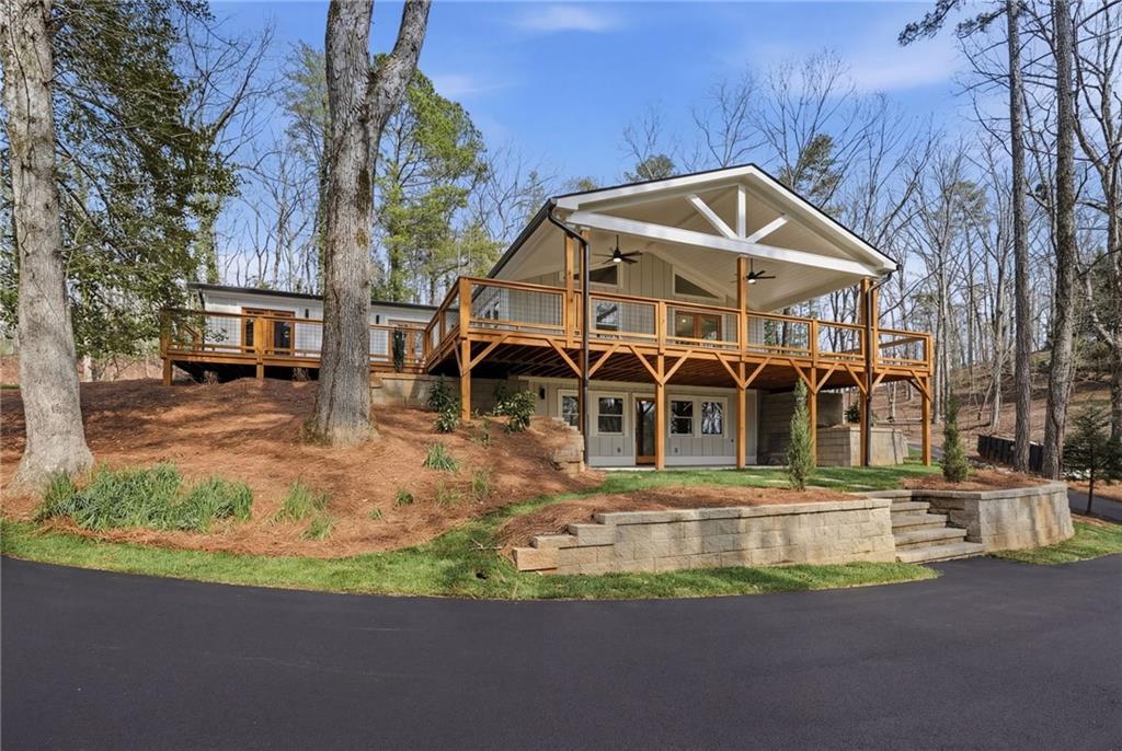 3454 Green Apple Road Gainesville, GA 30506 - Photo 4 of 115 a front view of a house with a yard