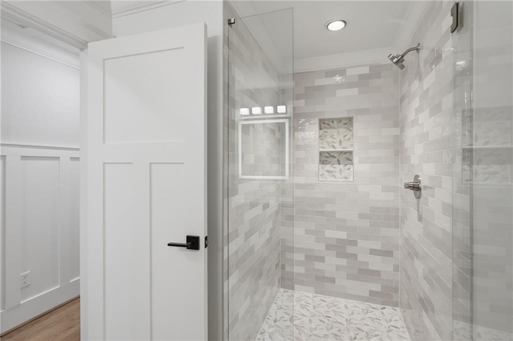 3454 Green Apple Road Gainesville, GA 30506 - Photo 53 of 115 a bathroom with a glass shower door