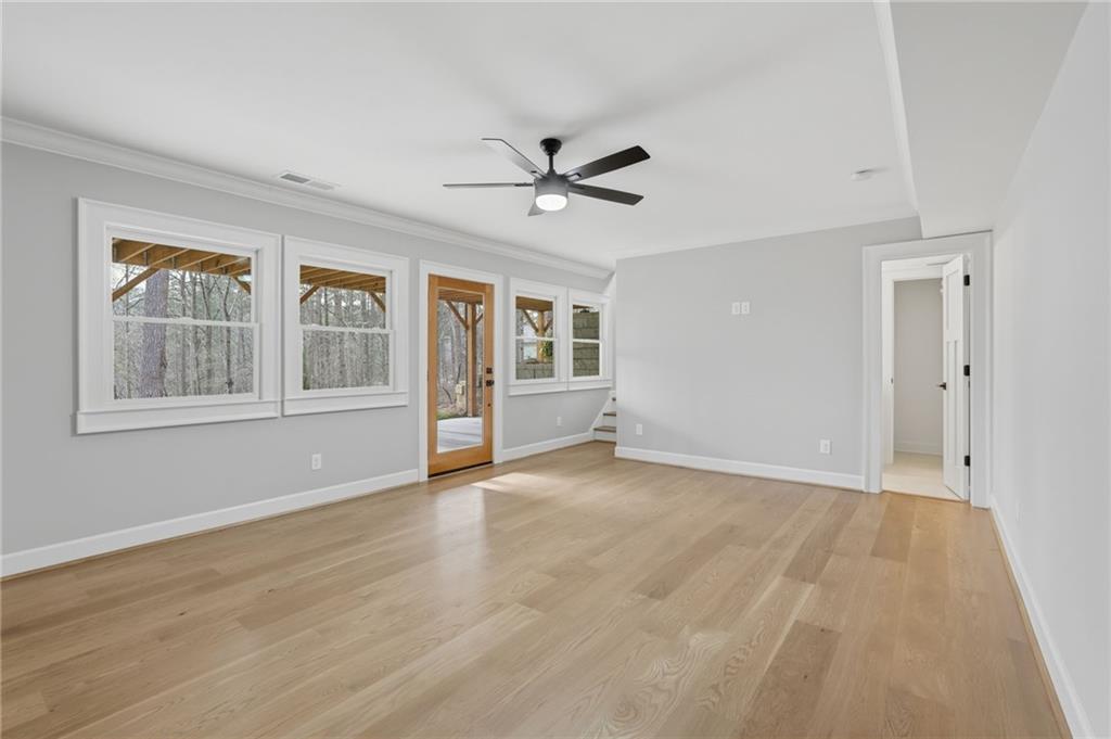 3454 Green Apple Road Gainesville, GA 30506 - Photo 57 of 115 a view of an empty room with a window and kitchen view