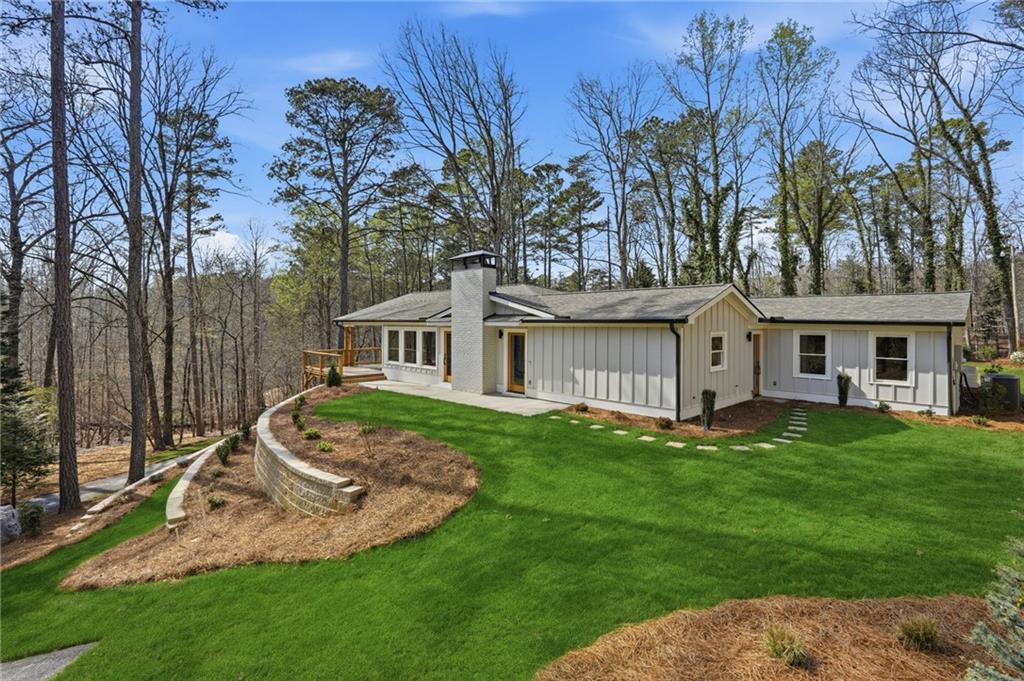 3454 Green Apple Road Gainesville, GA 30506 - Photo 66 of 115 a view of a house with a yard porch and sitting area
