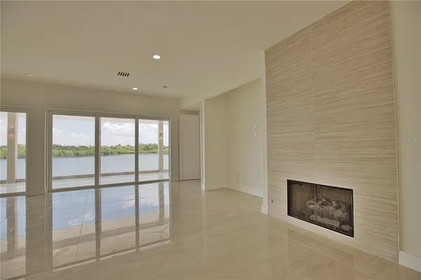 a view of empty room with windows