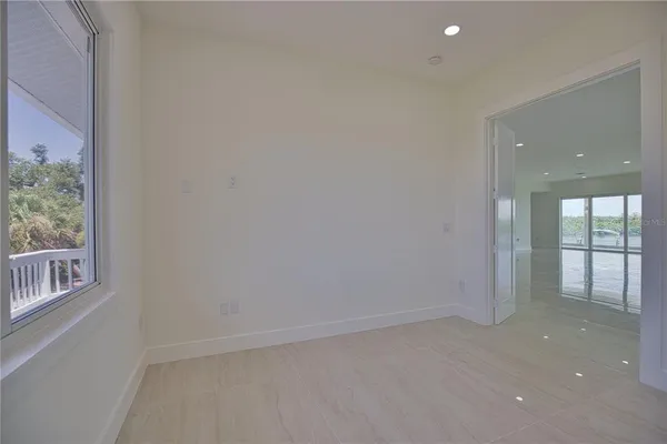 a view of a kitchen with a sink and microwave