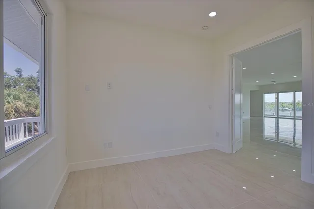 a view of a kitchen with a sink and microwave