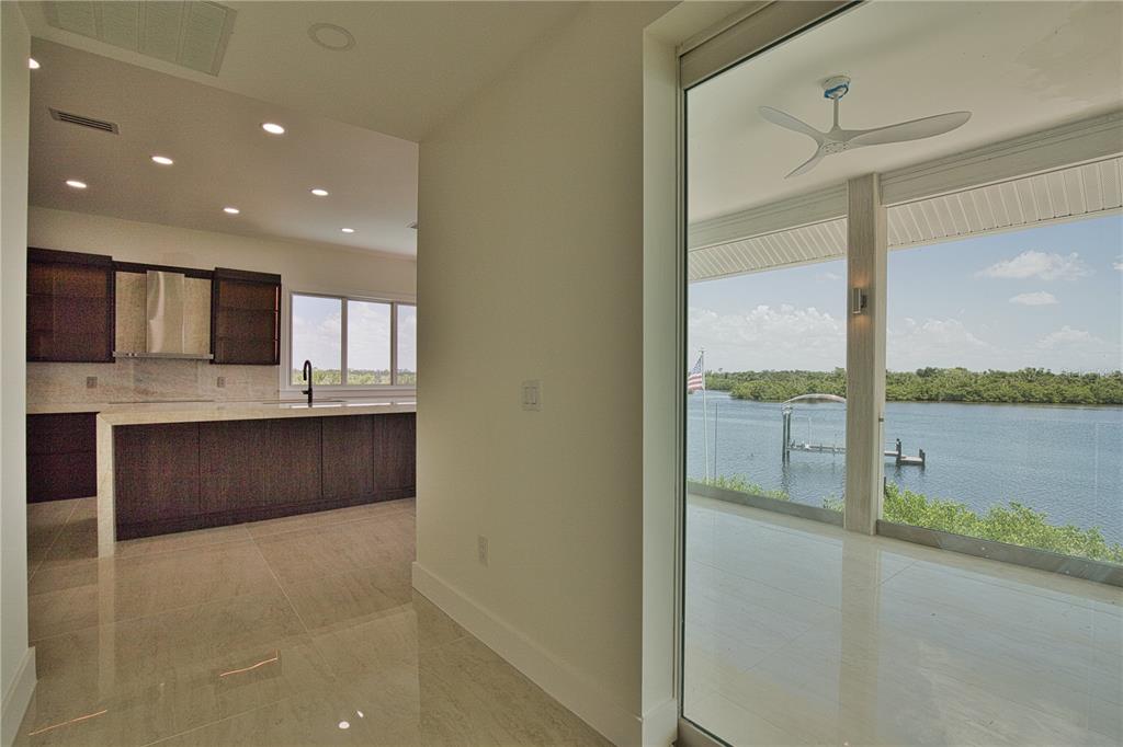 13064 Via Flavia Placida, FL 33946 - Photo 35 of 75 a view of a kitchen with a sink and microwave