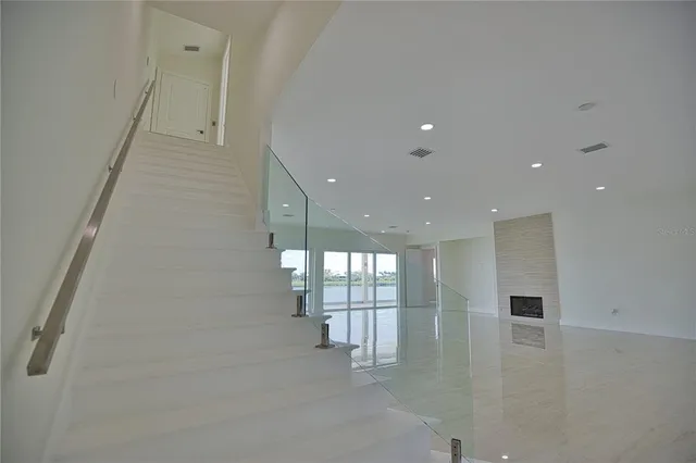 a view of a glass door and deck