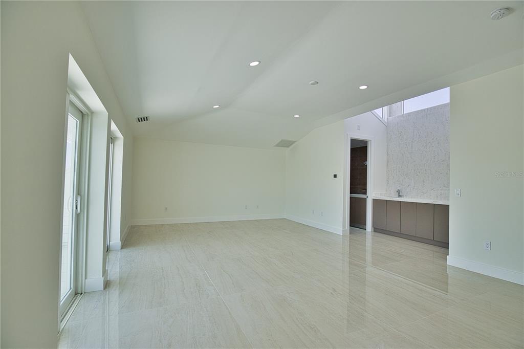 13064 Via Flavia Placida, FL 33946 - Photo 48 of 75 an empty room with a natural light