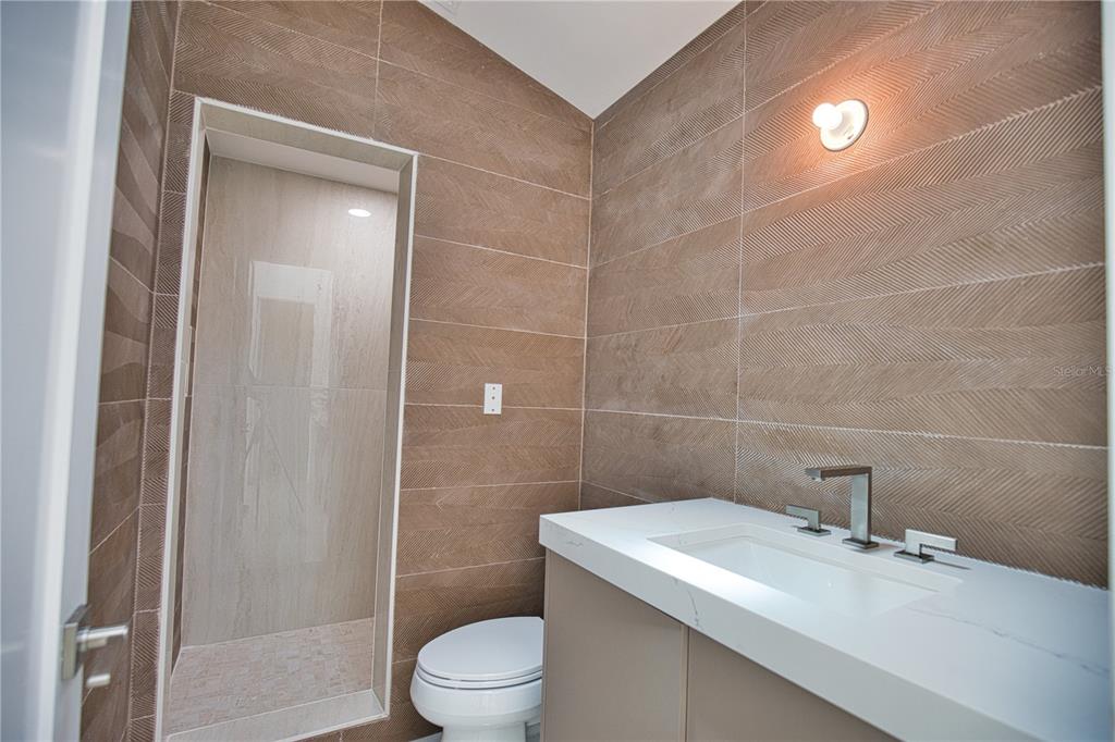 13064 Via Flavia Placida, FL 33946 - Photo 50 of 75 a bathroom with a sink a toilet and shower