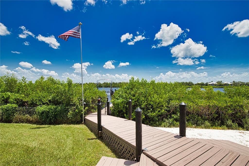 13064 Via Flavia Placida, FL 33946 - Photo 5 of 75 a swimming pool view with a garden space