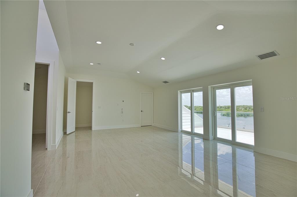 13064 Via Flavia Placida, FL 33946 - Photo 52 of 75 a view of an empty room with a window