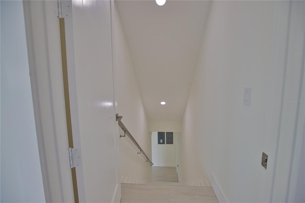13064 Via Flavia Placida, FL 33946 - Photo 59 of 75 a view of hallway with stairs