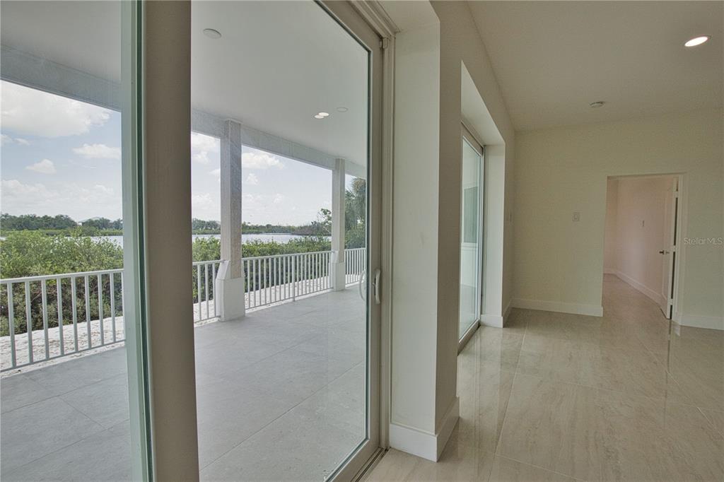 13064 Via Flavia Placida, FL 33946 - Photo 66 of 75 a view of a glass door and the balcony