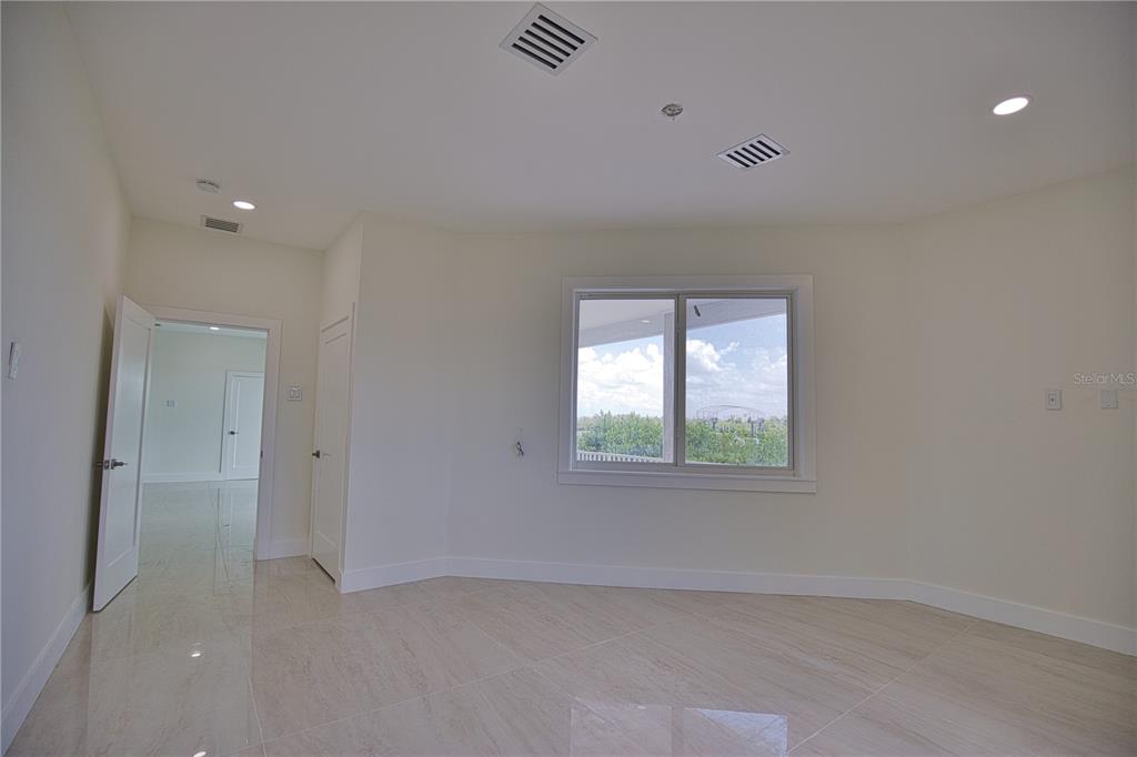 13064 Via Flavia Placida, FL 33946 - Photo 68 of 75 an empty room with a window