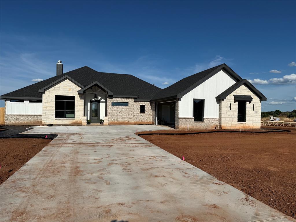 111 Bluestem Road Abilene, TX 79606 - Photo 1 of 1 a front view of a house with a yard