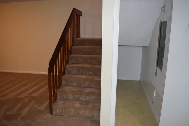 a view of entryway with wooden floor
