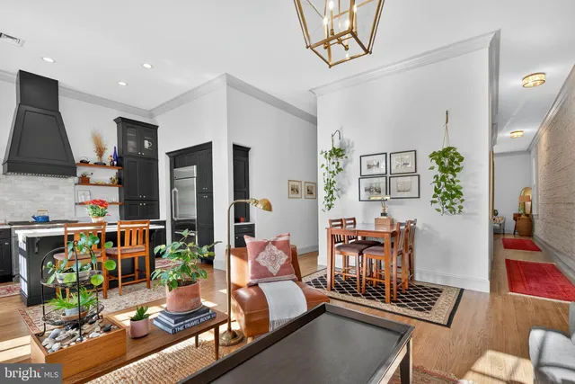 a living room with furniture and a table