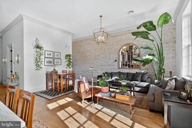 a living room with patio furniture