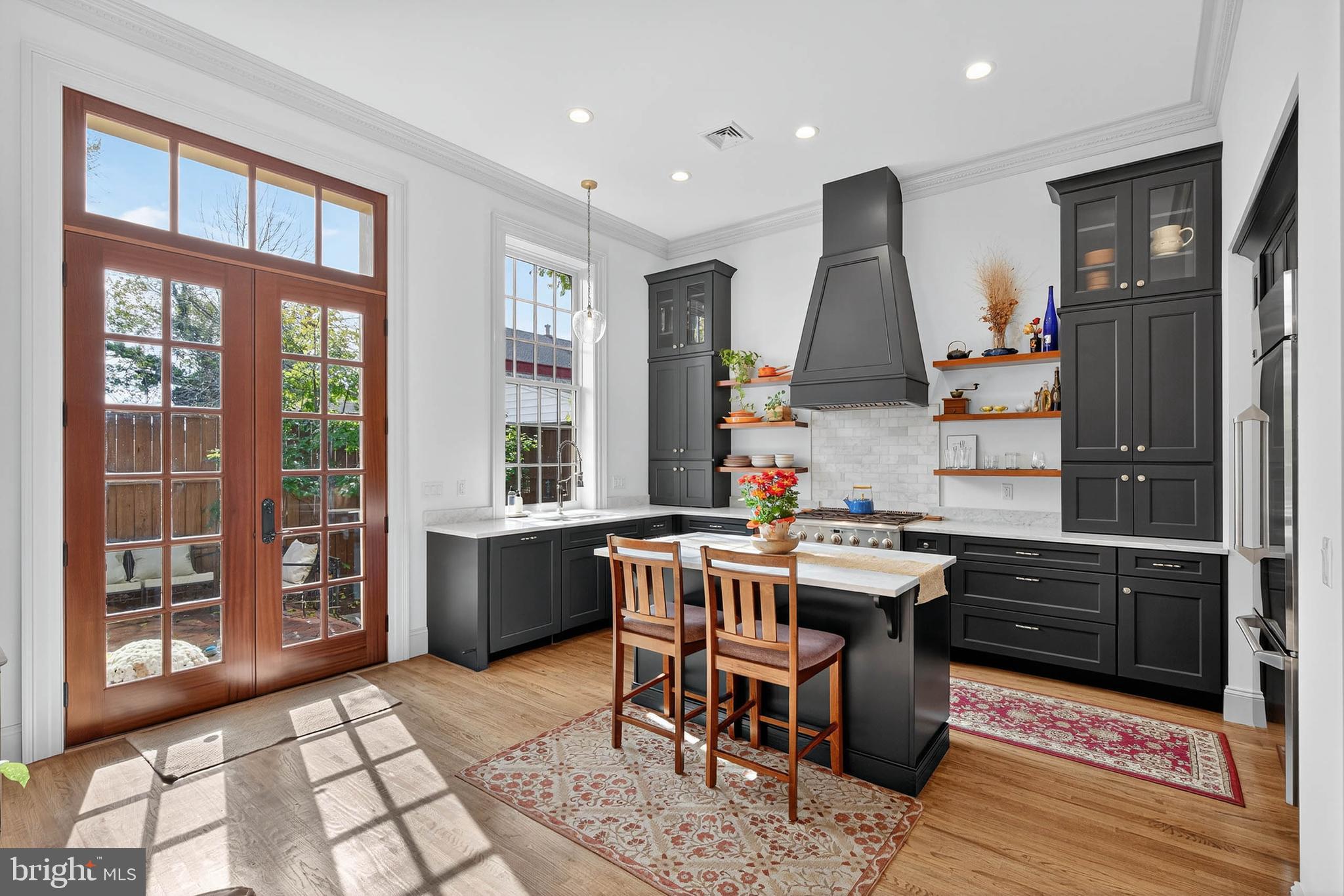 14 East Farnum Street Lancaster, PA 17602 - Photo 19 of 50 a kitchen with a sink a counter top space and stainless steel appliances
