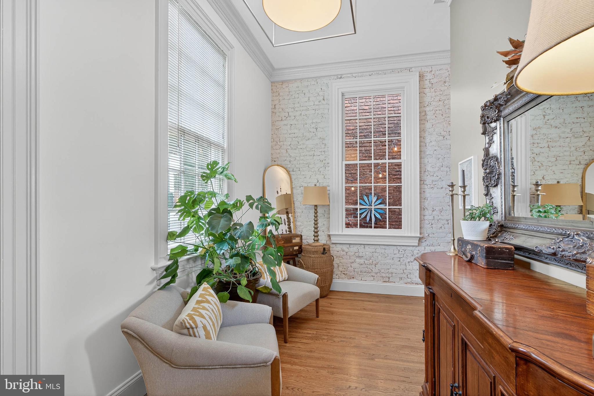 14 East Farnum Street Lancaster, PA 17602 - Photo 8 of 50 a living room with furniture and a potted plant