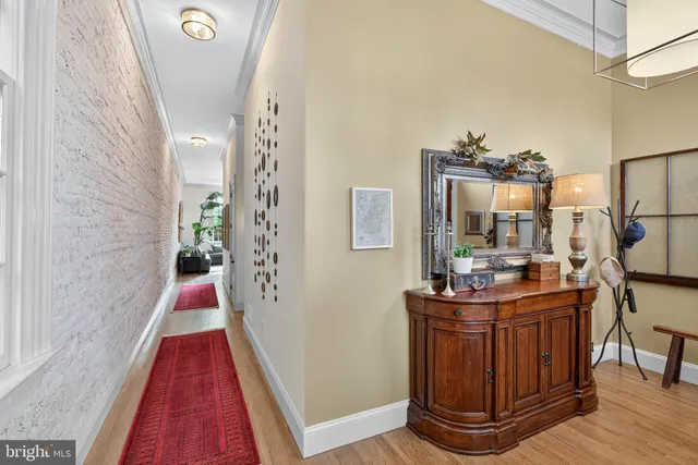 a view of a living room and entry way
