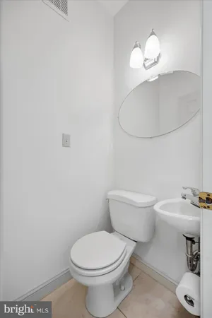 a bedroom with bed and window
