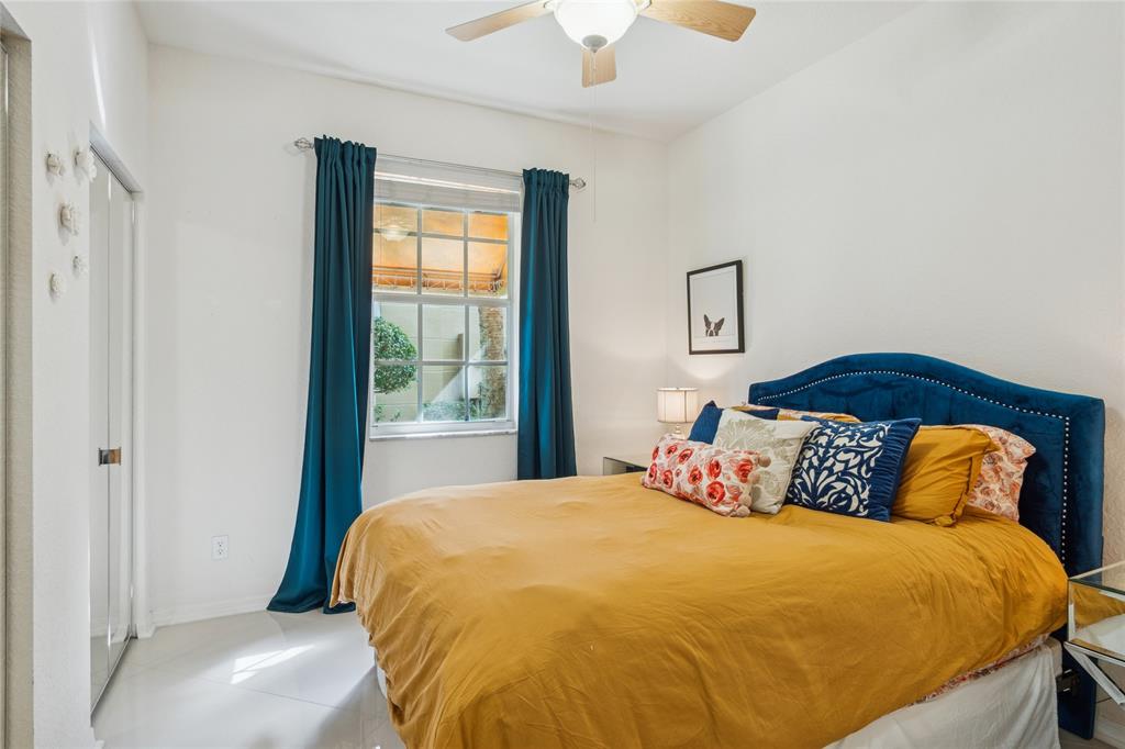 4910 Bonsai Circle, Unit 110 Palm Beach Gardens, FL 33418 - Photo 11 of 24 Guest Bedroom