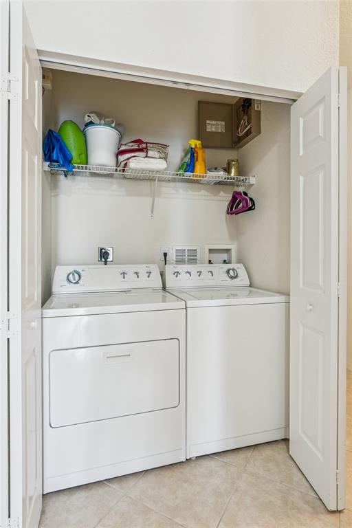 4910 Bonsai Circle, Unit 110 Palm Beach Gardens, FL 33418 - Photo 12 of 24 Full Size Washer and Dryer in the unit.