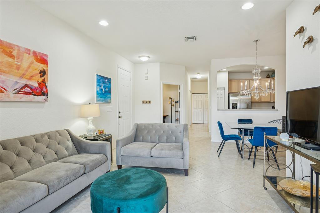 4910 Bonsai Circle, Unit 110 Palm Beach Gardens, FL 33418 - Photo 17 of 24 Living Room