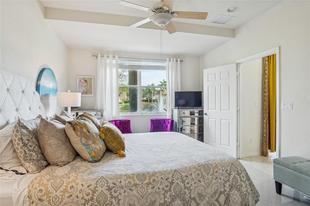 4910 Bonsai Circle, Unit 110 Palm Beach Gardens, FL 33418 - Photo 5 of 24 Master Bedroom