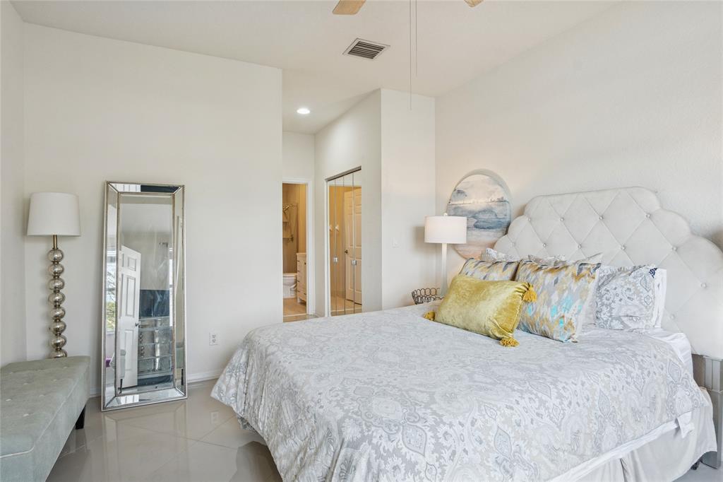 4910 Bonsai Circle, Unit 110 Palm Beach Gardens, FL 33418 - Photo 6 of 24 Master Bedroom