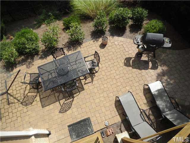 8410 Wheatstone Lane Raleigh, NC 27613 - Photo 20 of 25 As viewed from upper deck! Come visit this home today! Patio/Deck