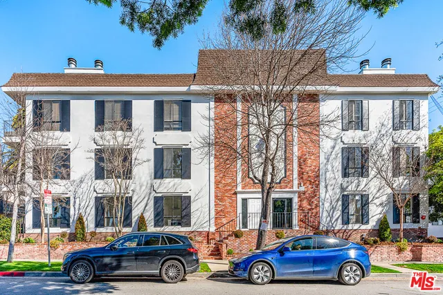 a car parked in front of a building
