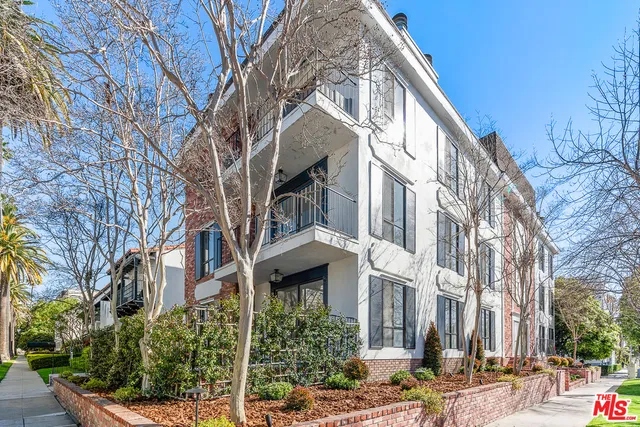a view of a building along a street