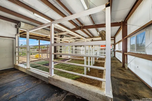 a view of an empty room with racks