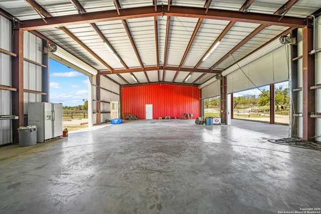a view of outdoor space with trees all around