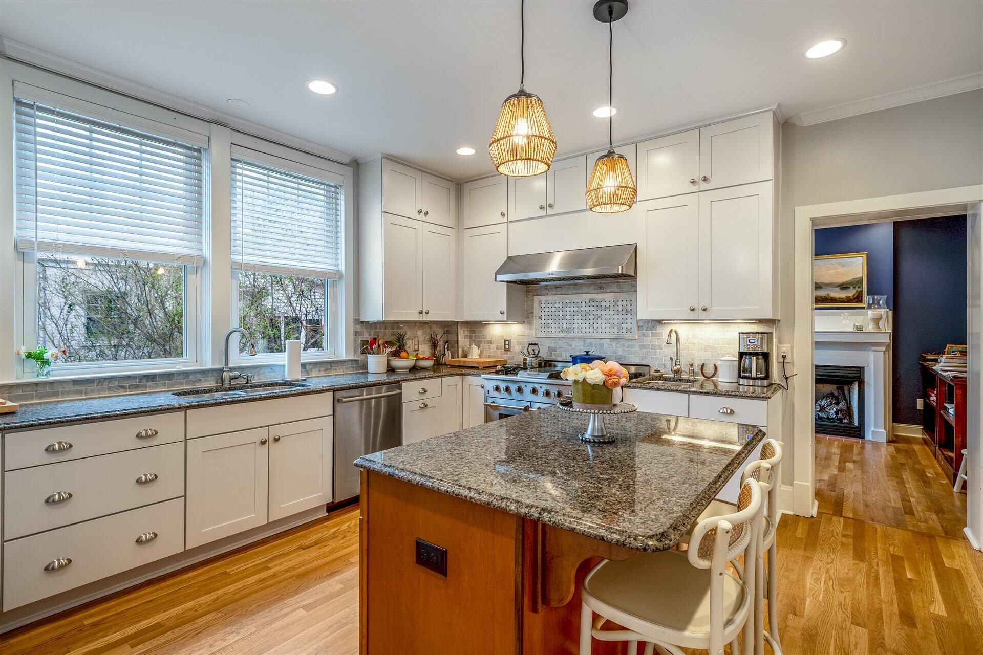 400 High Street Salem, VA 24153 - Photo 20 of 67 a kitchen with stainless steel appliances granite countertop a sink a stove and a wooden cabinets