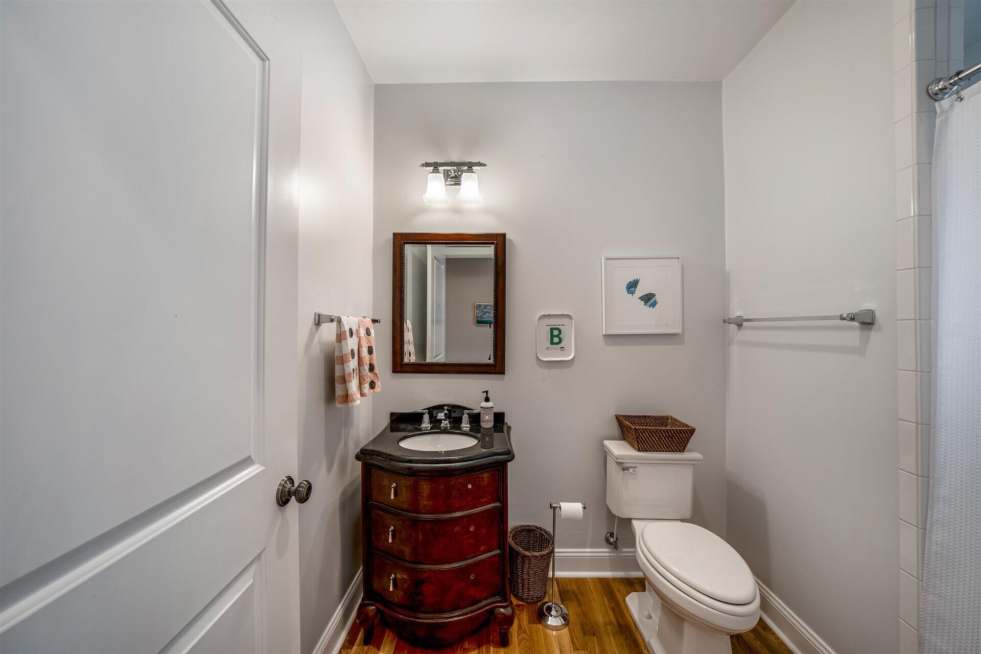 400 High Street Salem, VA 24153 - Photo 29 of 67 a white toilet sitting next to a bathroom sink