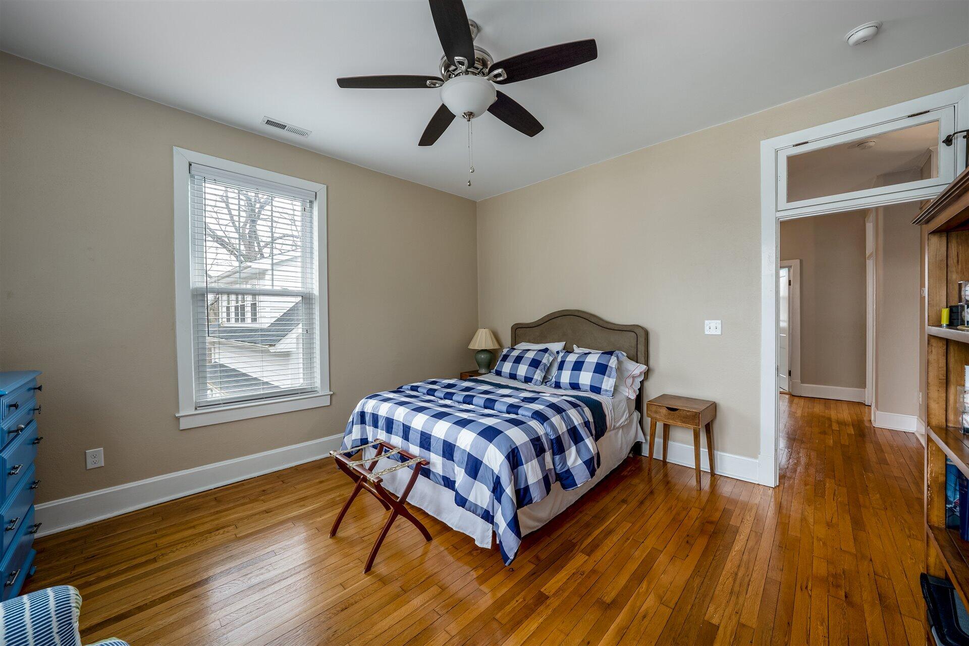 400 High Street Salem, VA 24153 - Photo 35 of 67 a bedroom with a bed and wooden floor