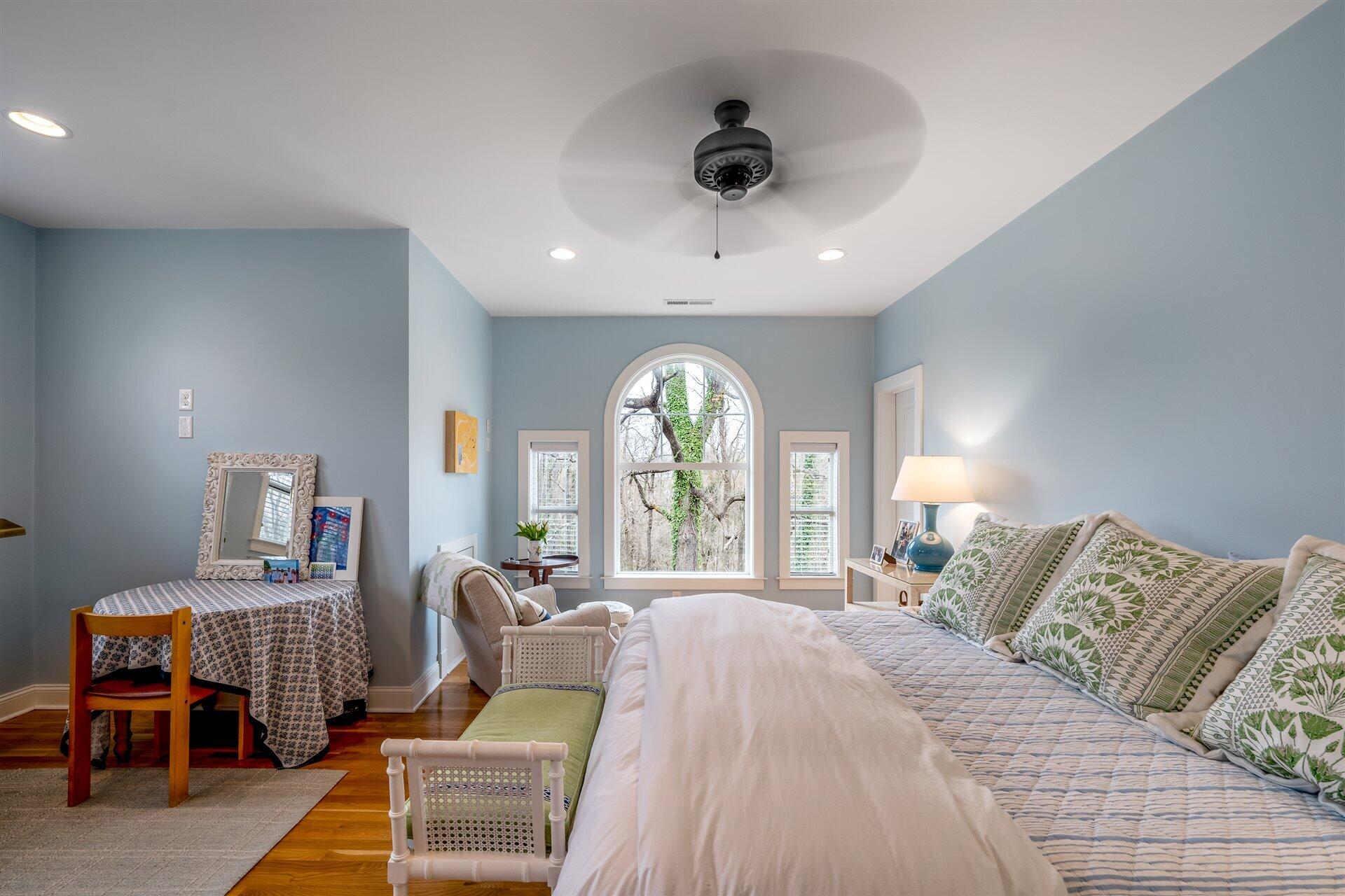400 High Street Salem, VA 24153 - Photo 43 of 67 a spacious bedroom with a bed window and a chandelier