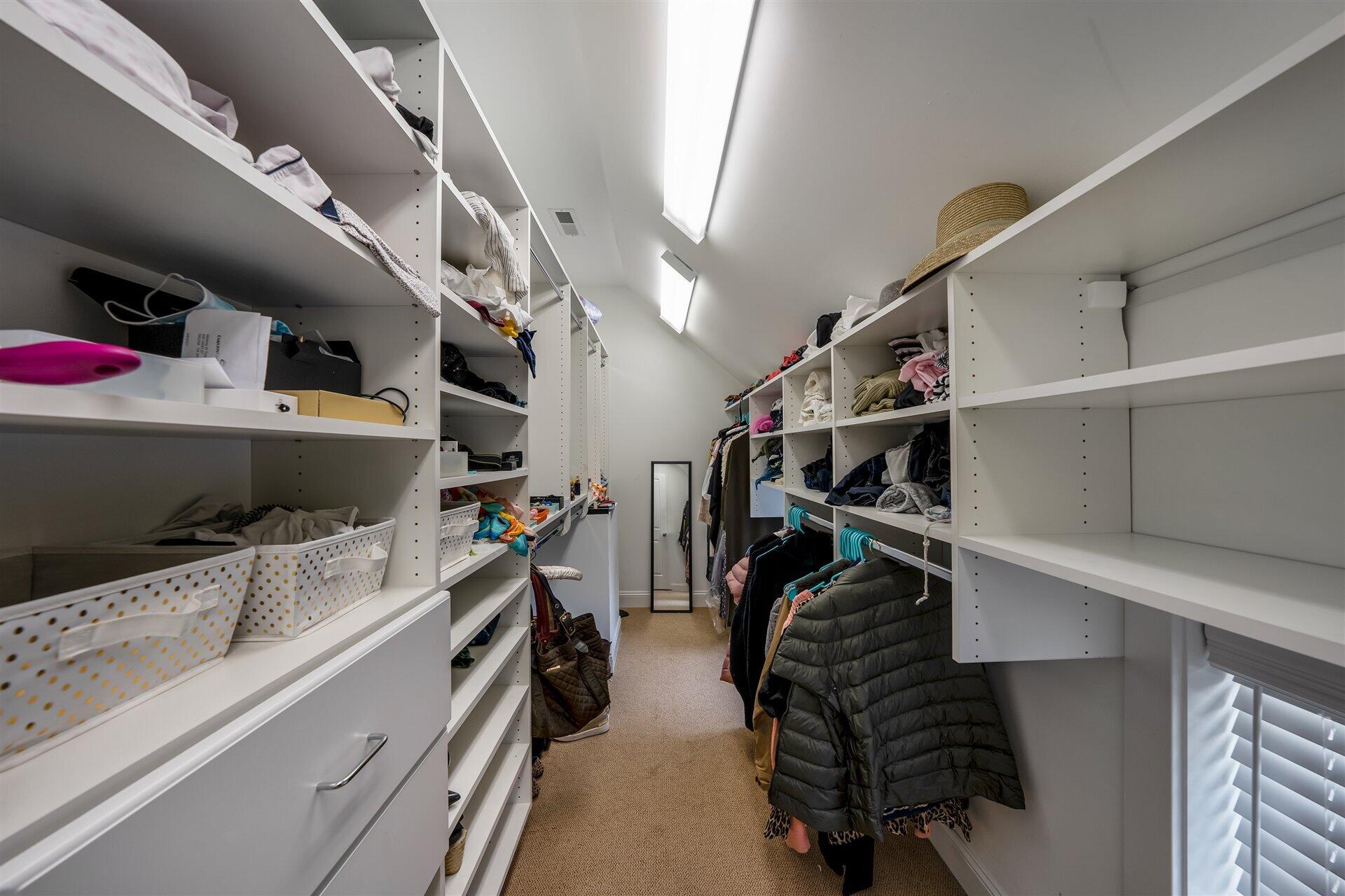 400 High Street Salem, VA 24153 - Photo 50 of 67 a view of walk in closet with clothes and shoes