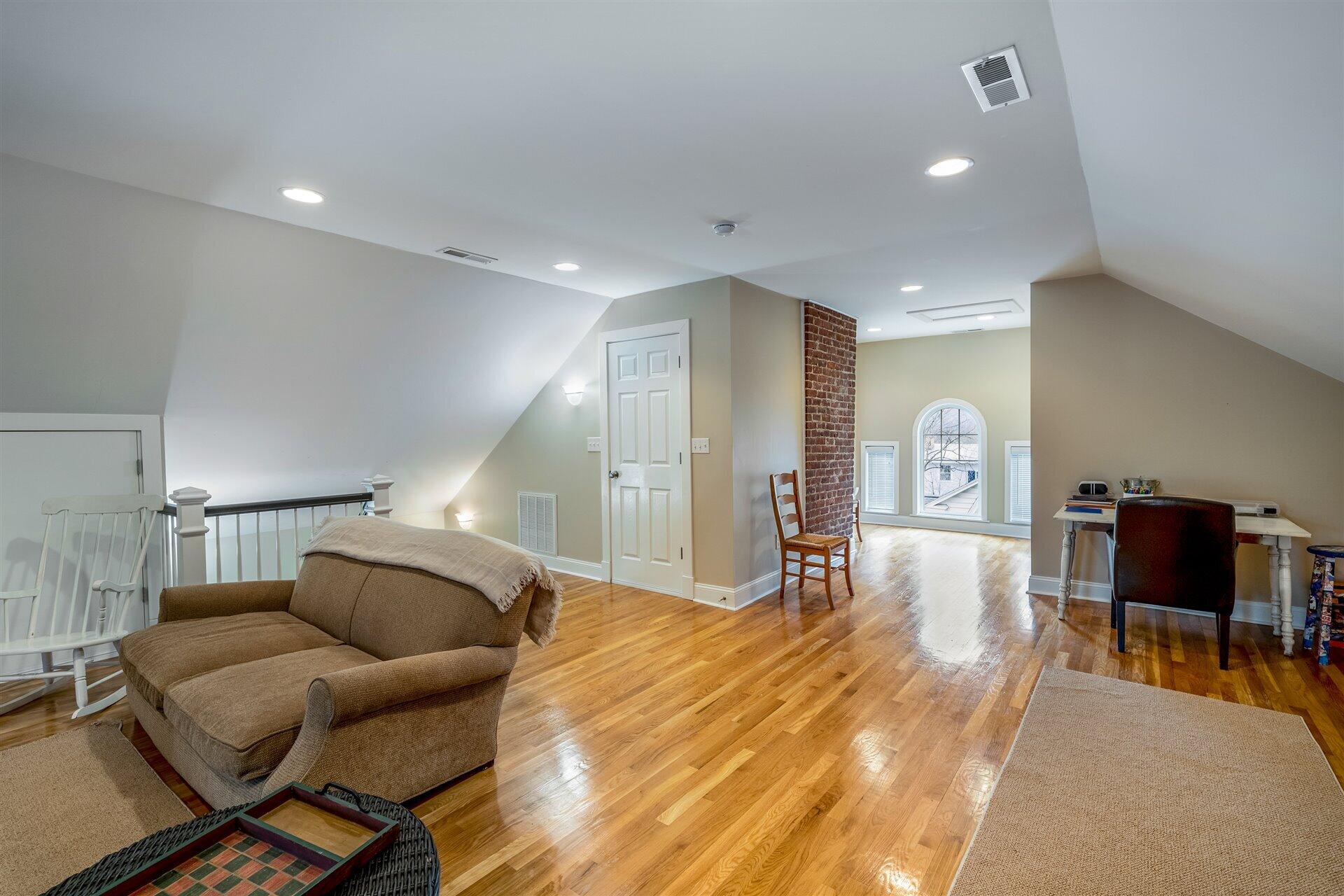 400 High Street Salem, VA 24153 - Photo 56 of 67 a living room with furniture and a wooden floor