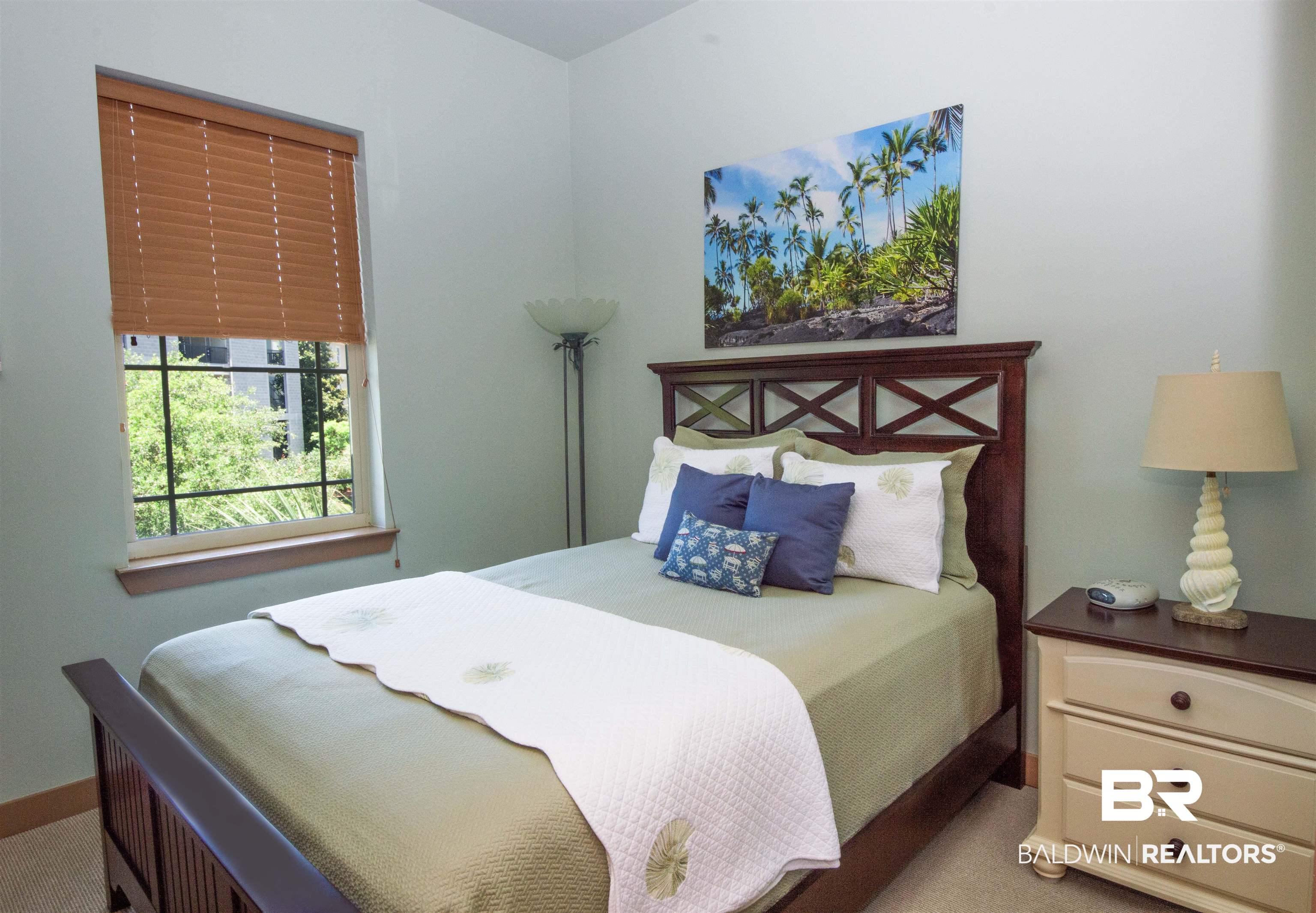 1430 Regency Road, Unit 301C Gulf Shores, AL 36542 - Photo 11 of 22 Bedroom featuring light colored carpet