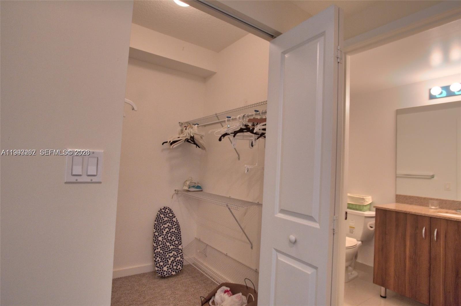 601 Northeast 23rd Street, Unit 1004 Miami, FL 33137 - Photo 13 of 17 a bathroom with a shower