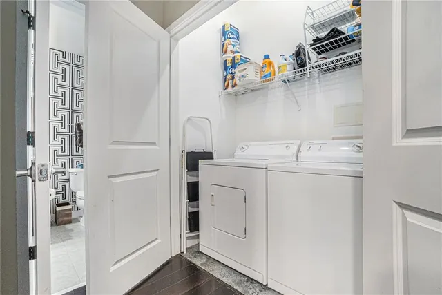 a utility room with dryer and washer